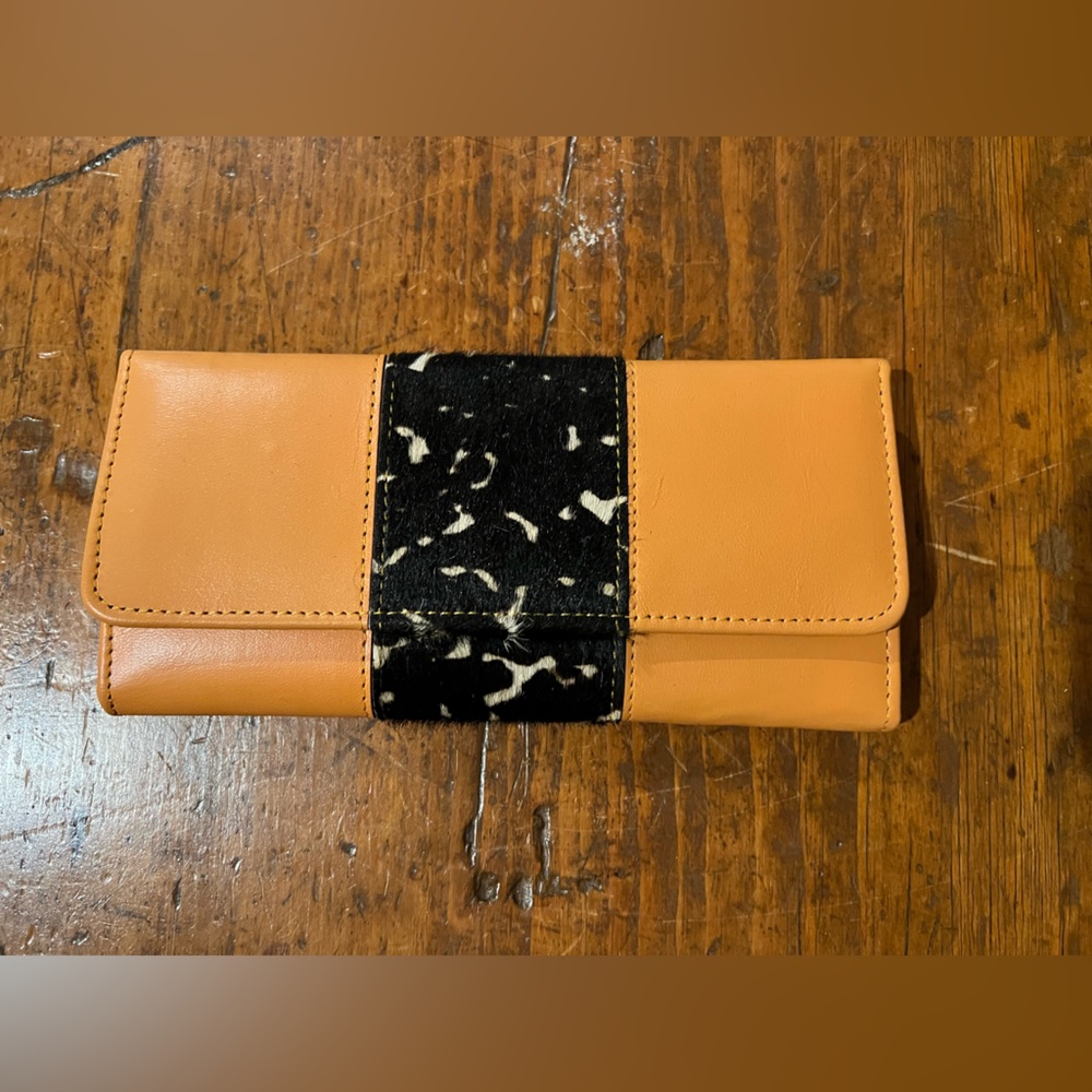 Tri fold leather wallet